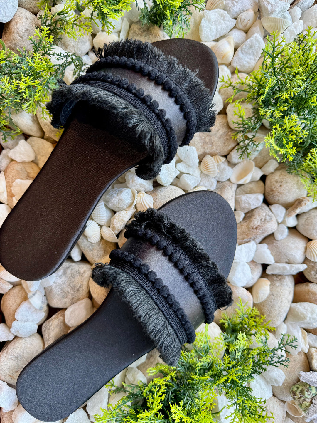 Black pom pom sandals