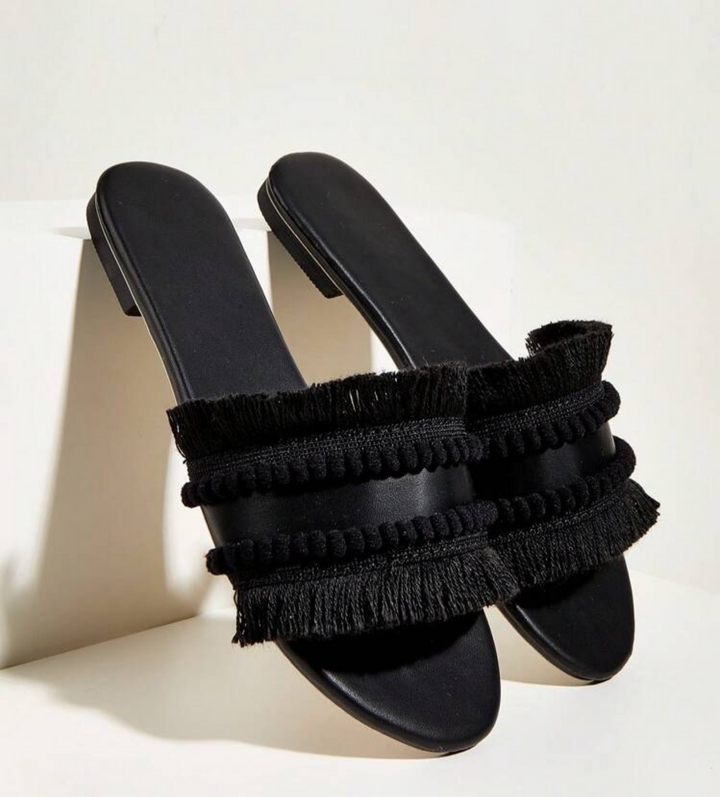 Black pom pom sandals
