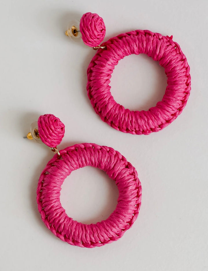 Circular raffia earrings pink