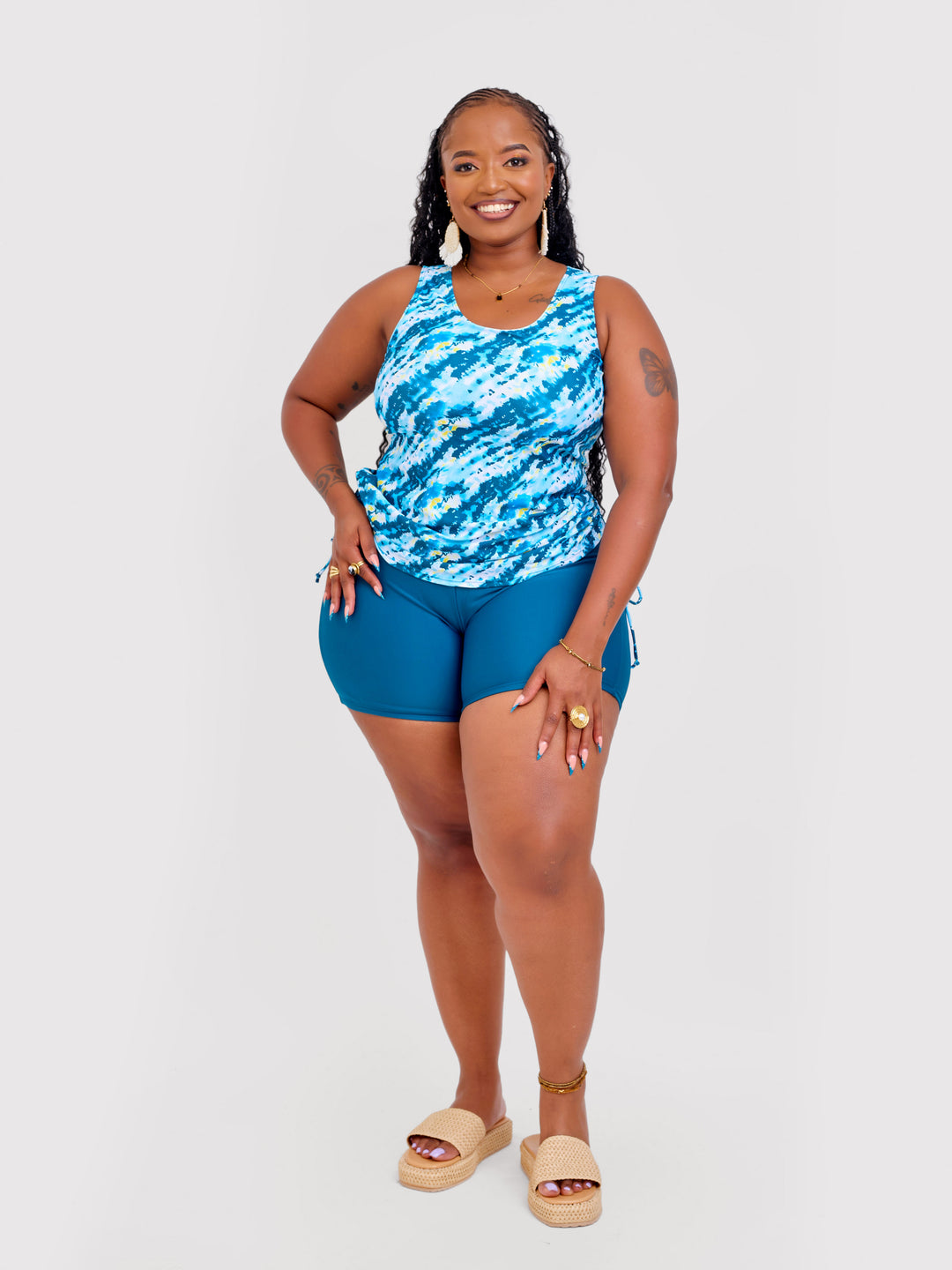 Turquoise tankini with shorts