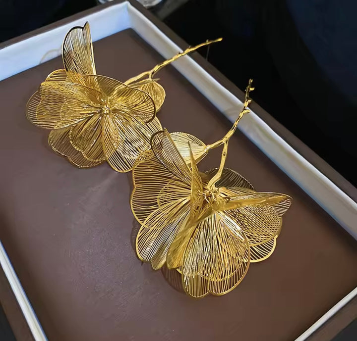 Gold floral dangle earrings