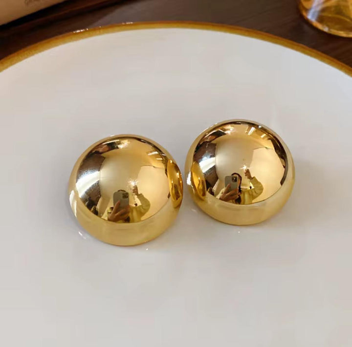Round gold earrings