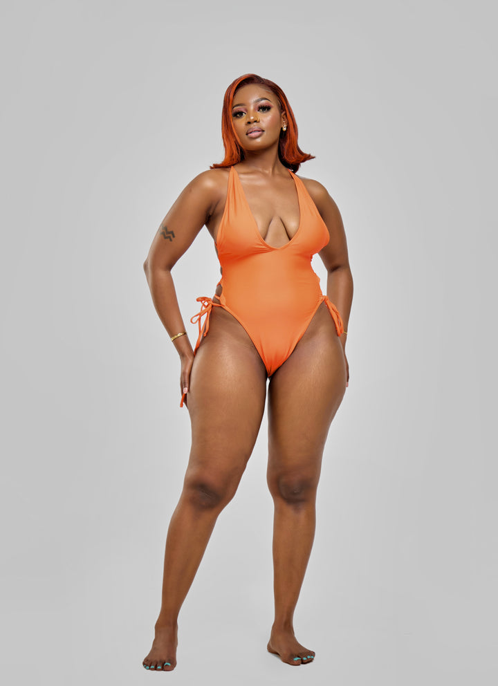 Orange one piece with drawstrings