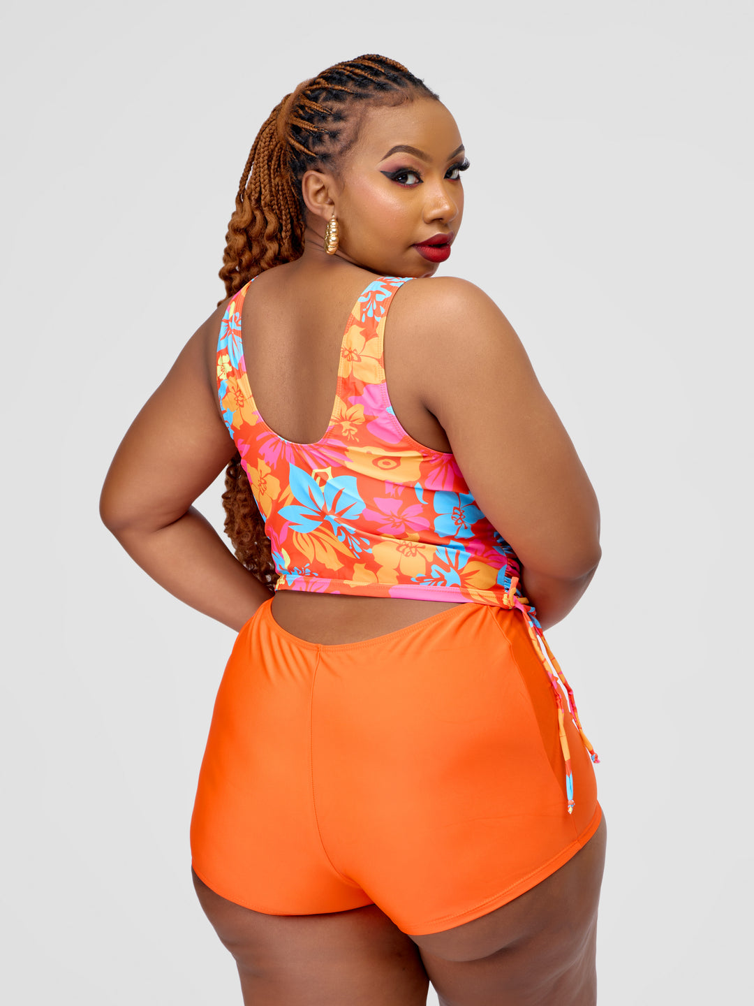 Tankini vest with orange shorts