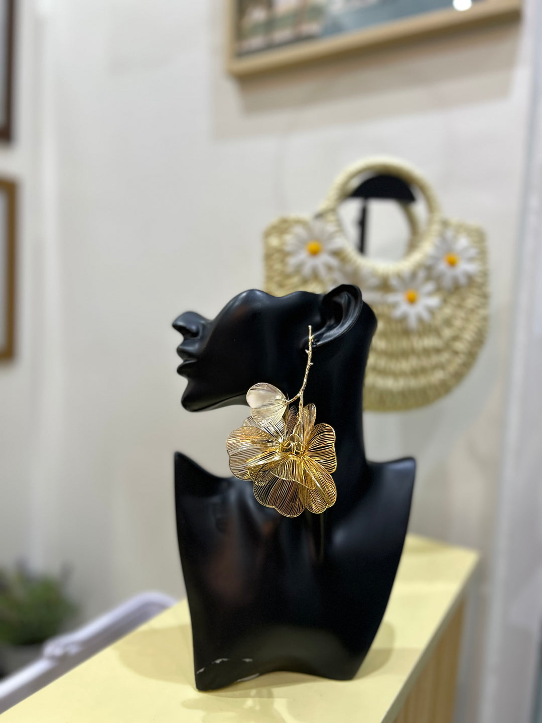 Gold floral dangle earrings