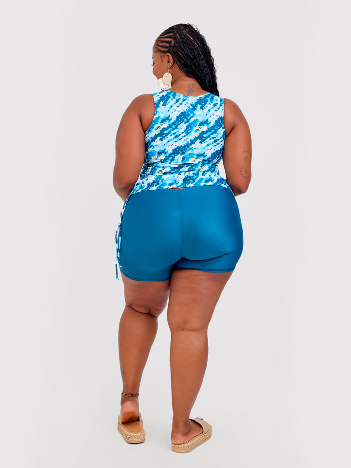Turquoise tankini with shorts
