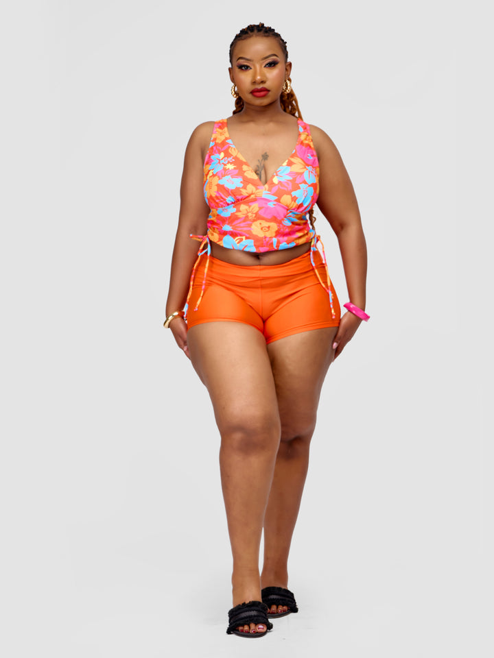 Tankini vest with orange shorts